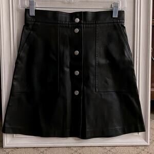 French Black snap front faux leather skirt XS
